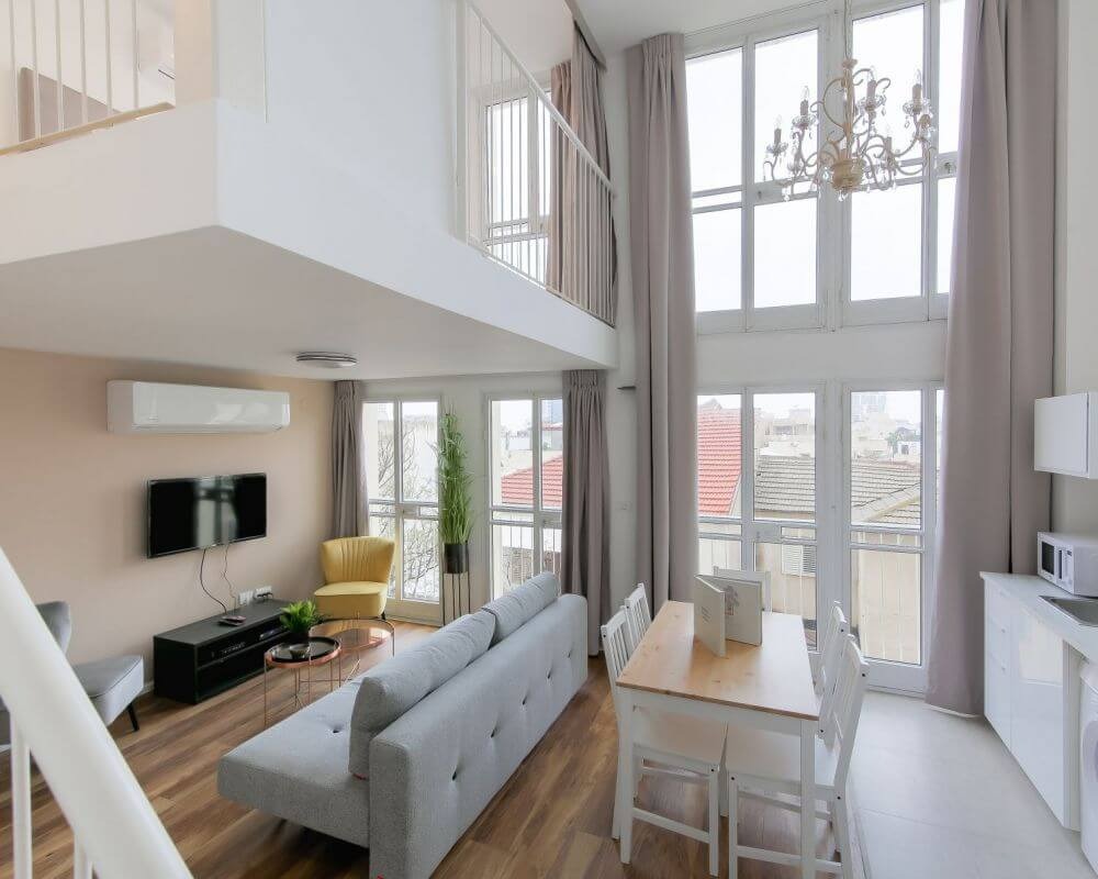 Modern mezzanine apartment with high ceilings