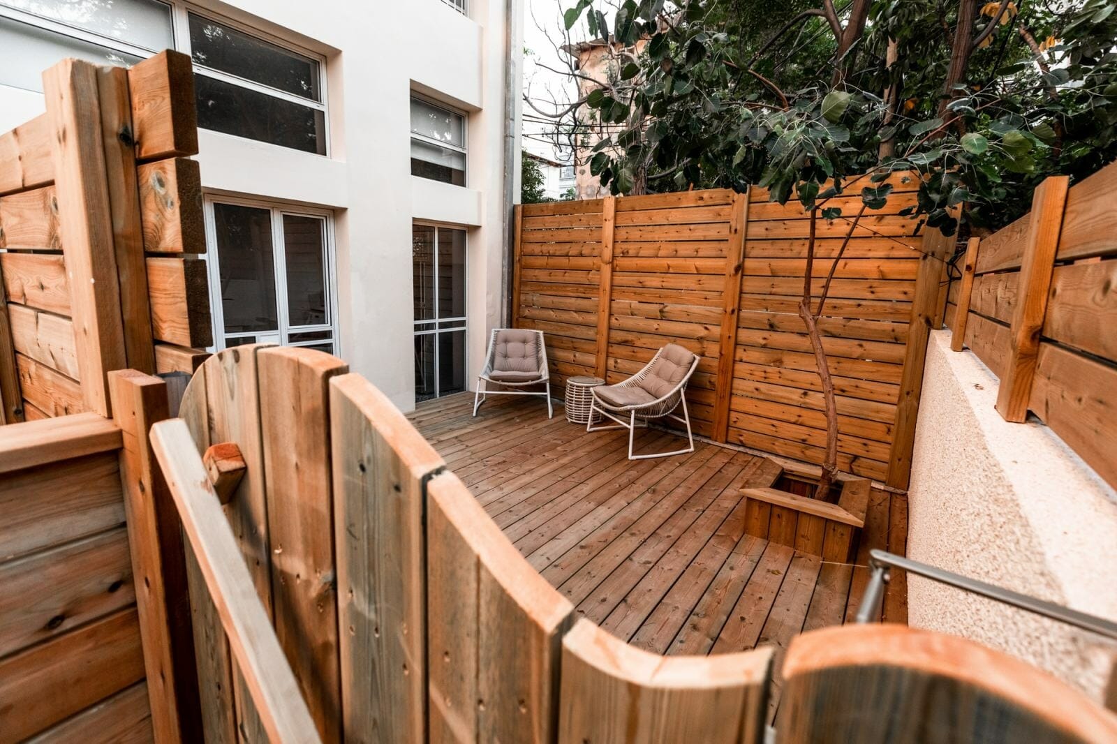 Private wooden terrace with garden seating