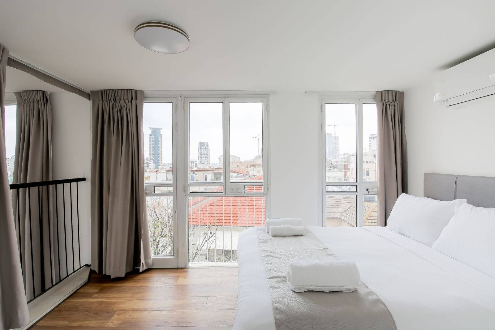 Bedroom with Tel Aviv skyline view